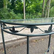 Grey-green wrought iron half-moon console with glass, 85cm.