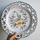 Decorative plate of Moustiers earthenware diameter 24 cm