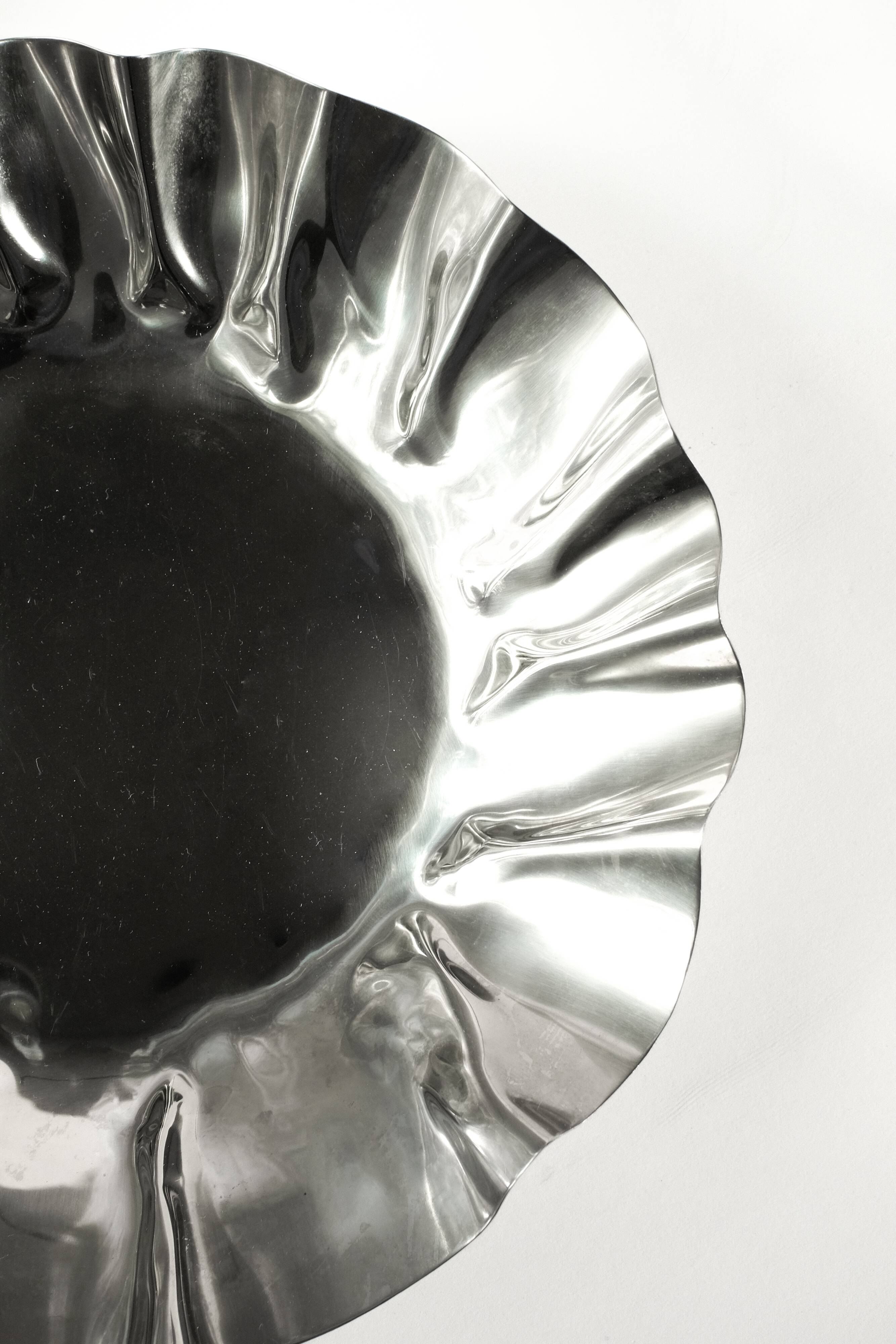 Large folded chrome bowl