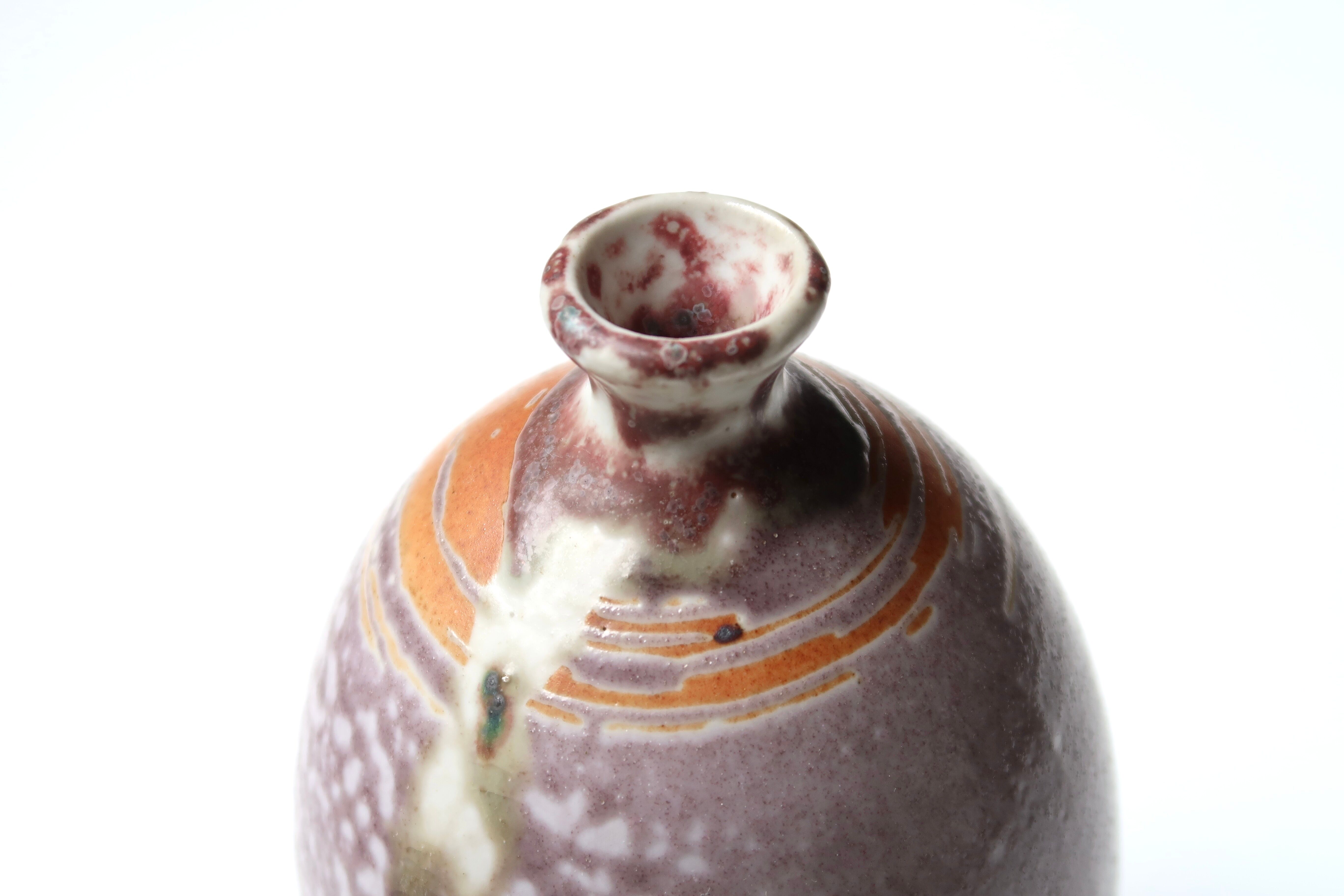 Purple sandstone vase signed, 70s