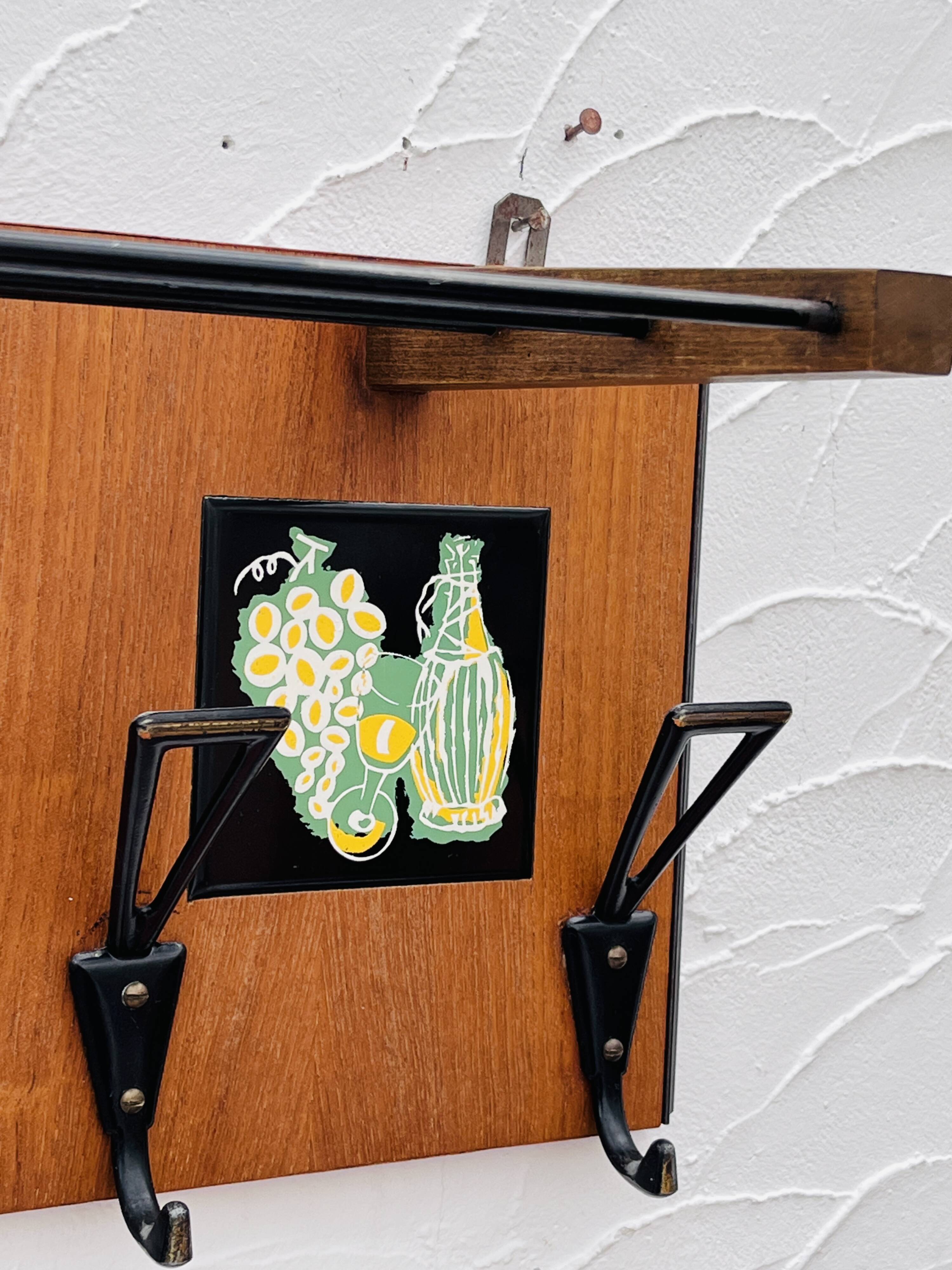 Vintage wooden wall coat rack mirror from the 1960s.