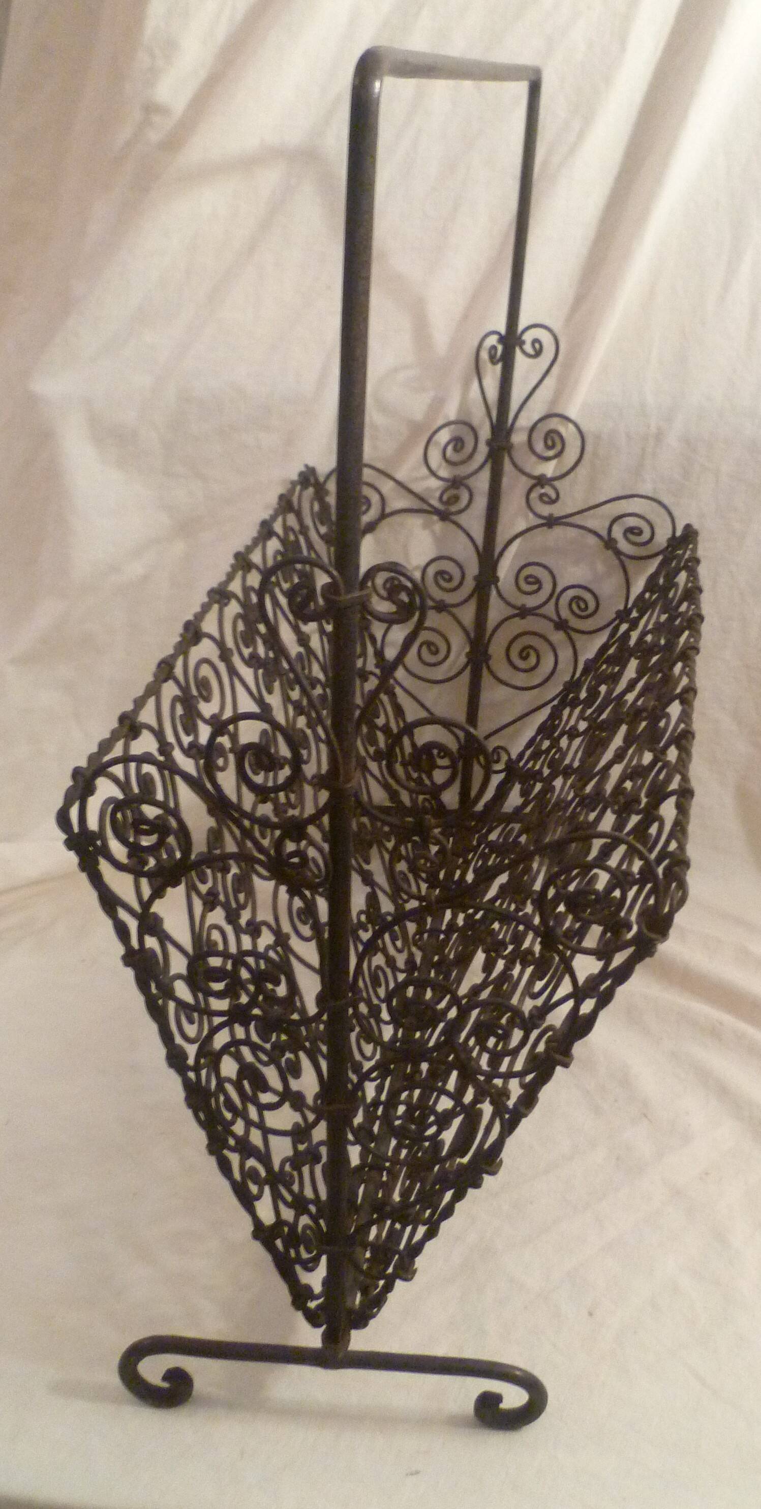 Hand wrought iron magazine rack 1950s collector vintage