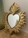 Golden ex-voto wall heart