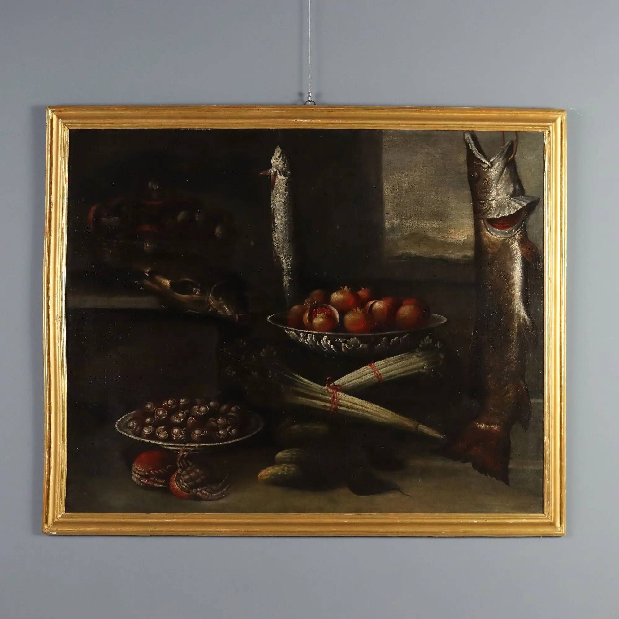 Old painting of still life with fish and snails, oil on canvas from the 1600s.