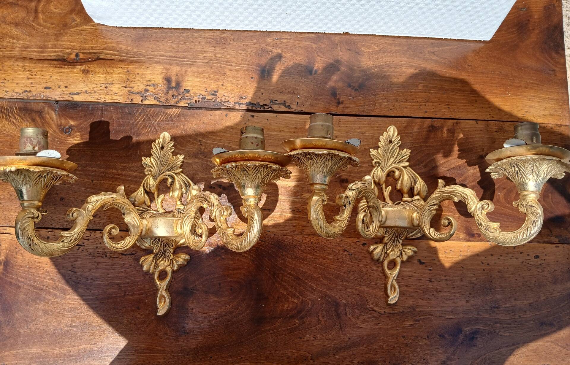 Pair of wall sconces in gilded bronze, Rococo style, Louis XV.