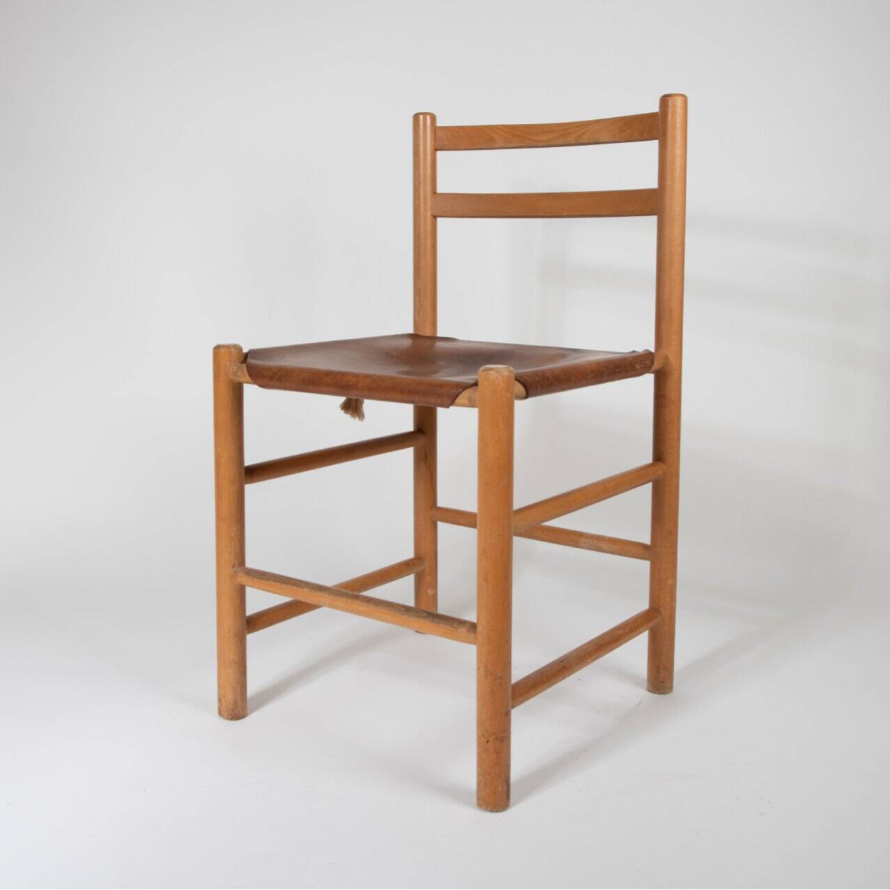70s dining chair by Ate van Apeldoorn in pine and saddle leather