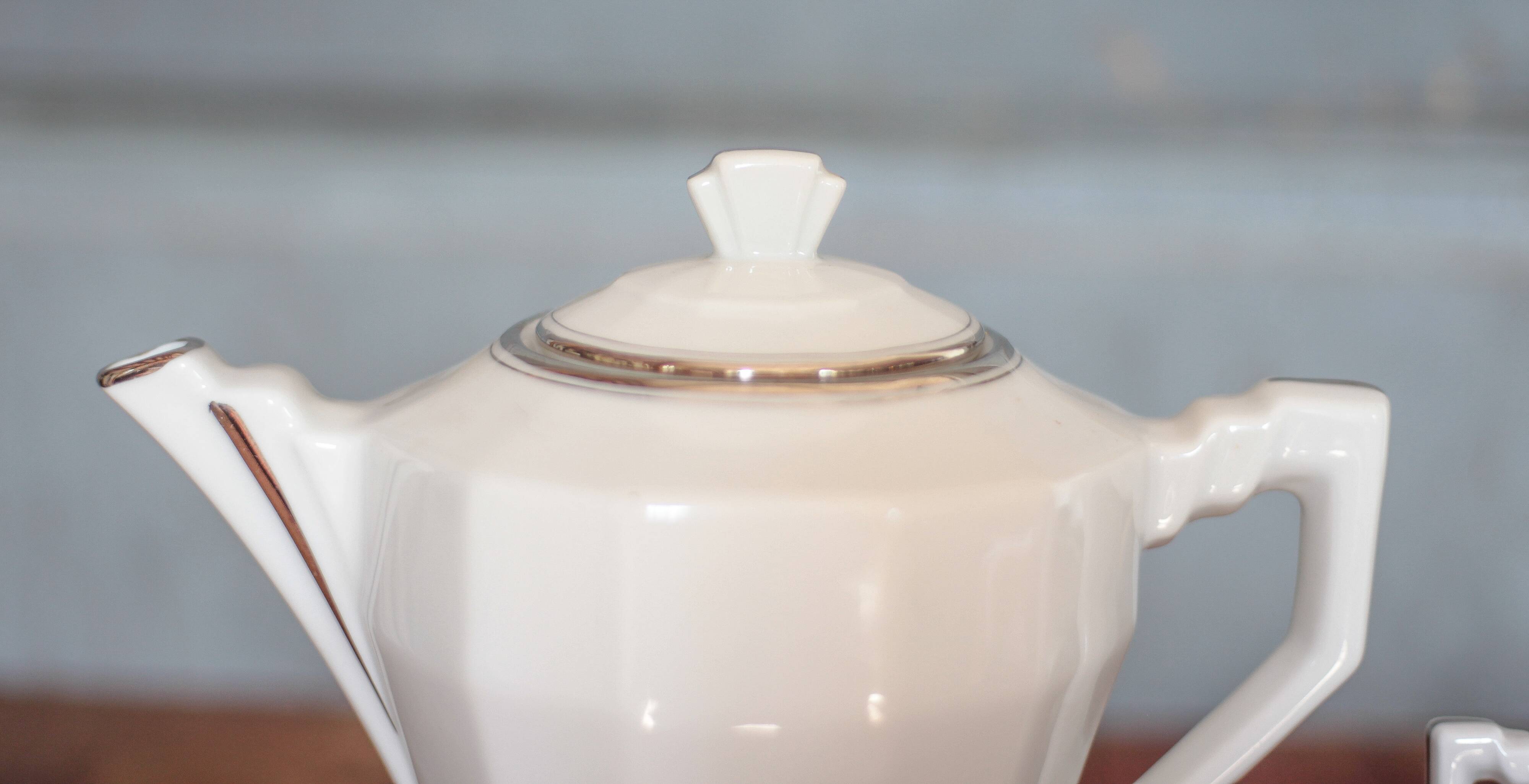 Art Deco porcelain teapot and its sugar bowl, porcelain coffee pot, kitchen.