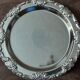 Silver-coloured metal plate