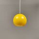 Spherical pendant lamp in sunny yellow.