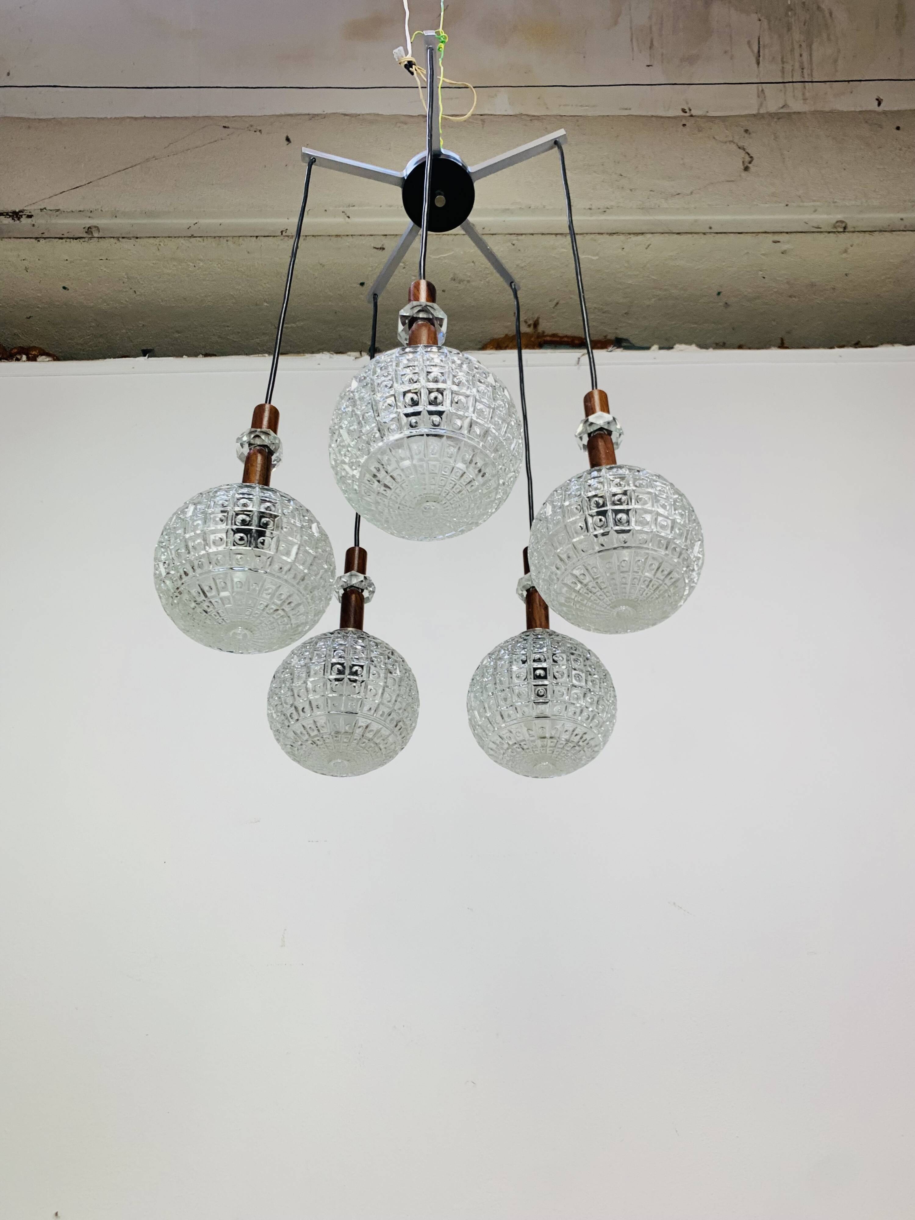 Scandinavian suspension cascade, 5 moulded glass globes and teak, 1960s