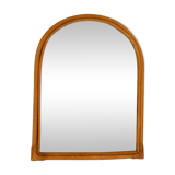 Rounded wall mirror in rattan 35x45cm