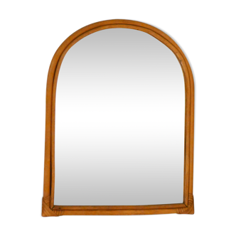 Rounded wall mirror in rattan 35x45cm