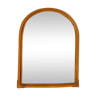 Rounded wall mirror in rattan 35x45cm