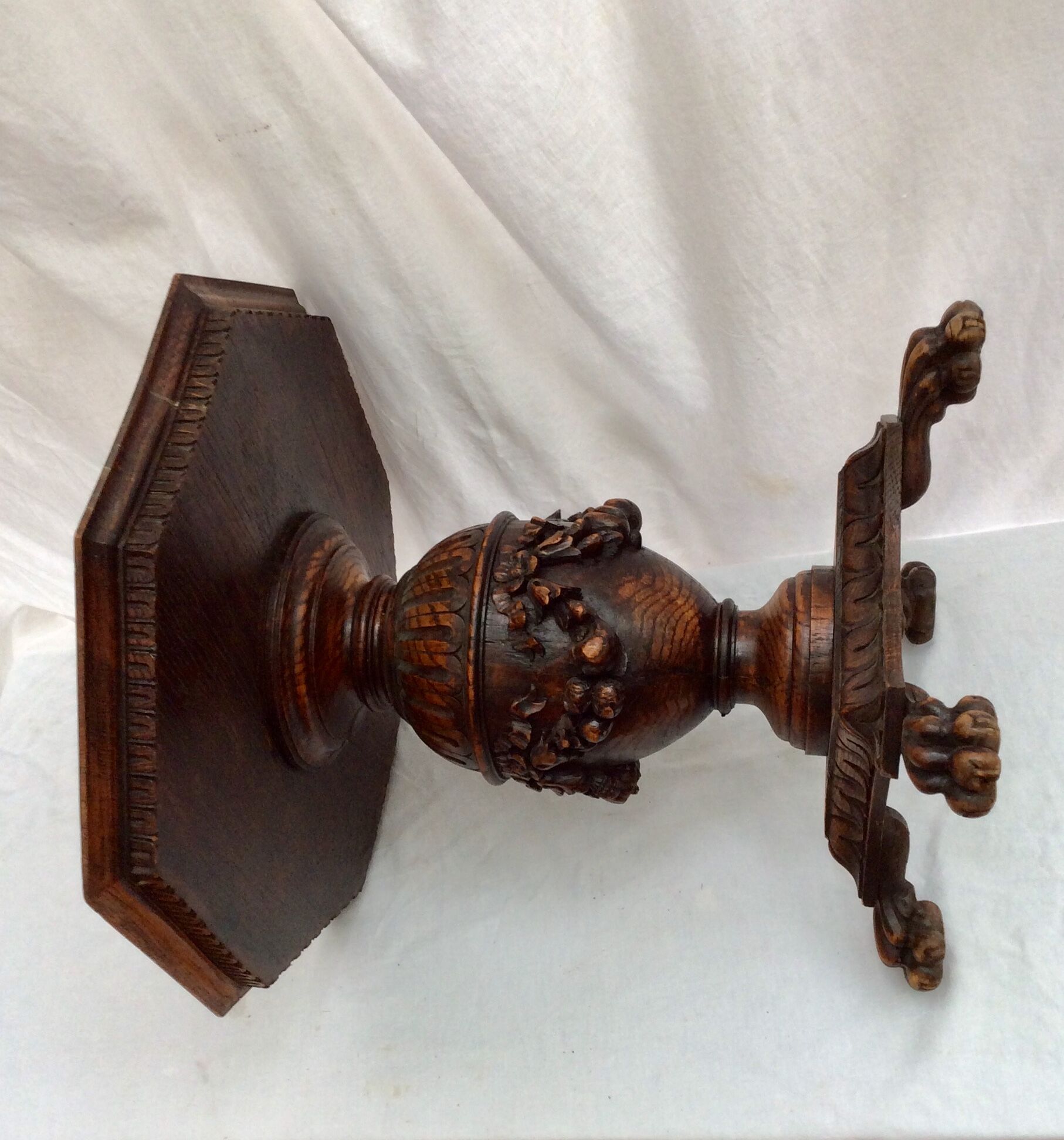Old healer in carved solid oak