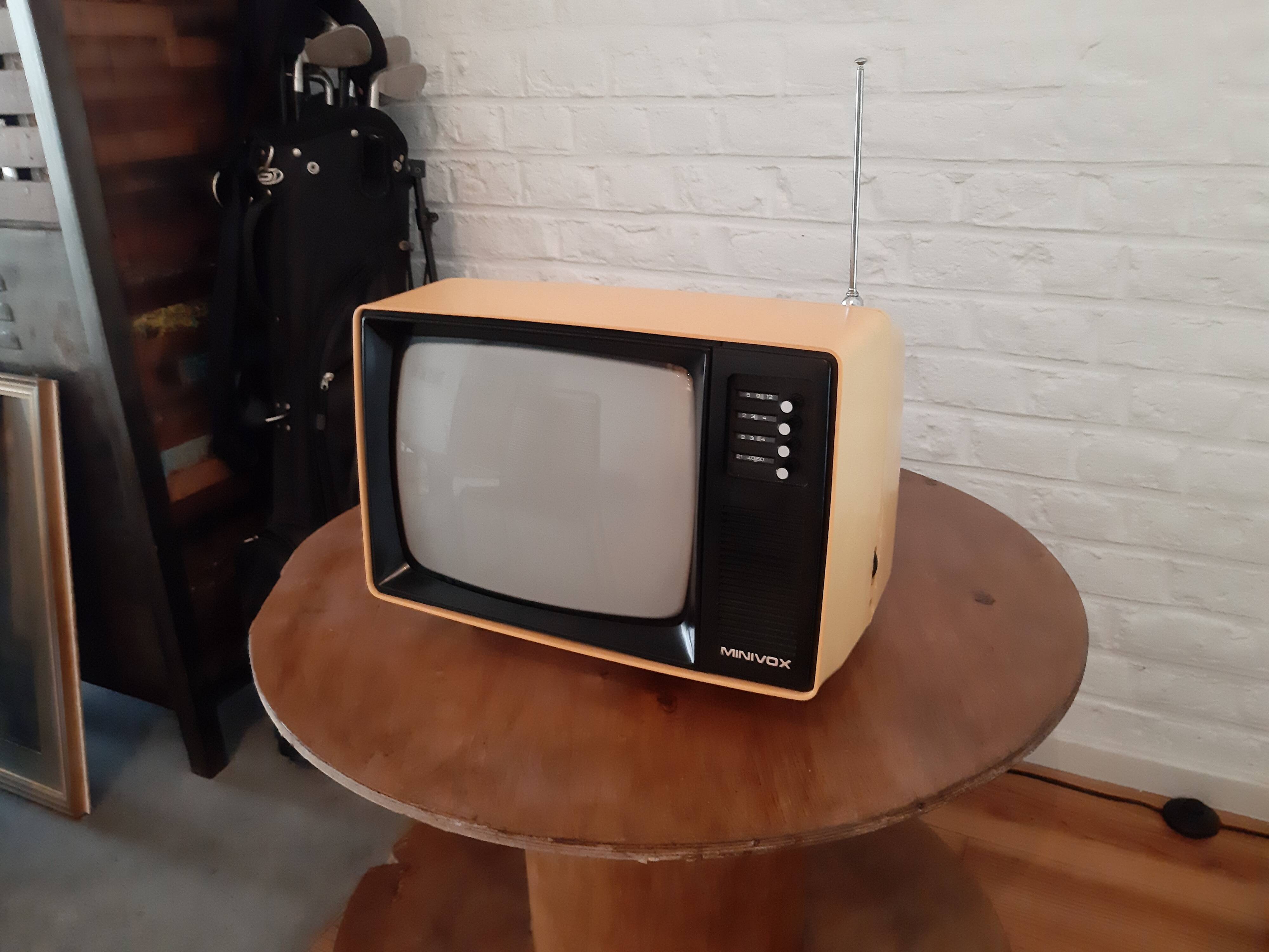 Yellow minivox vintage tv