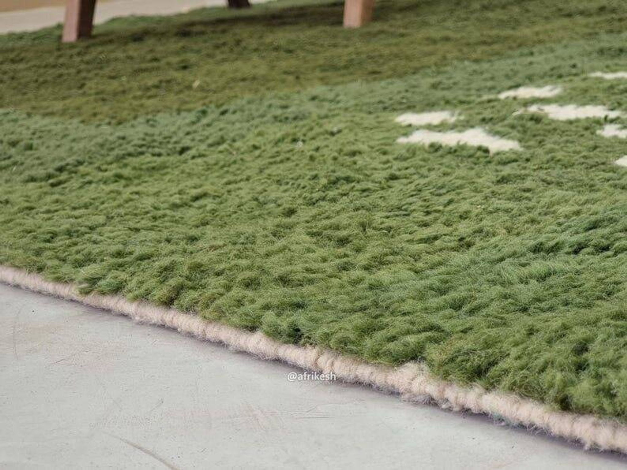 Traditional handwoven green Moroccan wool rug