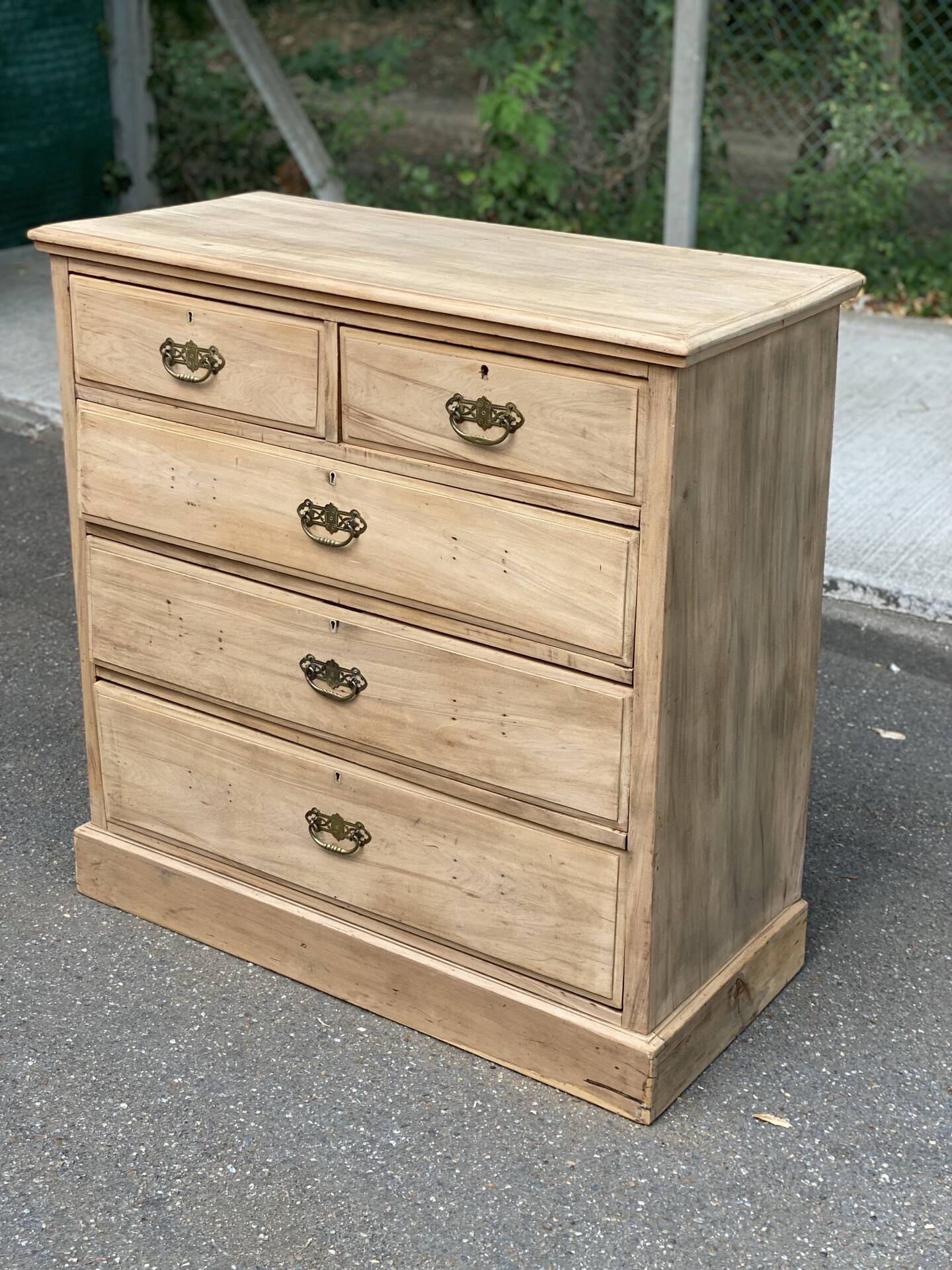 English stripped commode made of solid raw wood from the 19th century.