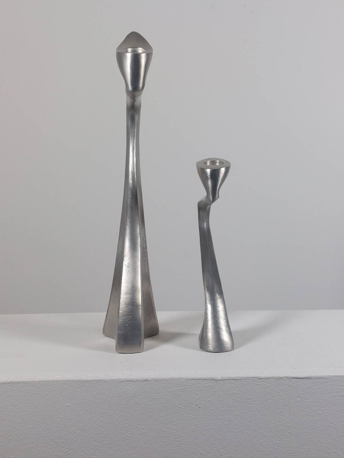 Pair of postmodern aluminium candlesticks by Matthew Hilton