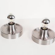 Pair of petite Disc sconces selected by Charlotte Perriand for Les Arcs
