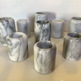 Nine marble candlesticks