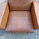 Paire de fauteuils vintage en skaï marron