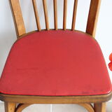 Bistro chair with bars of the 50s in wood and imitation red leather