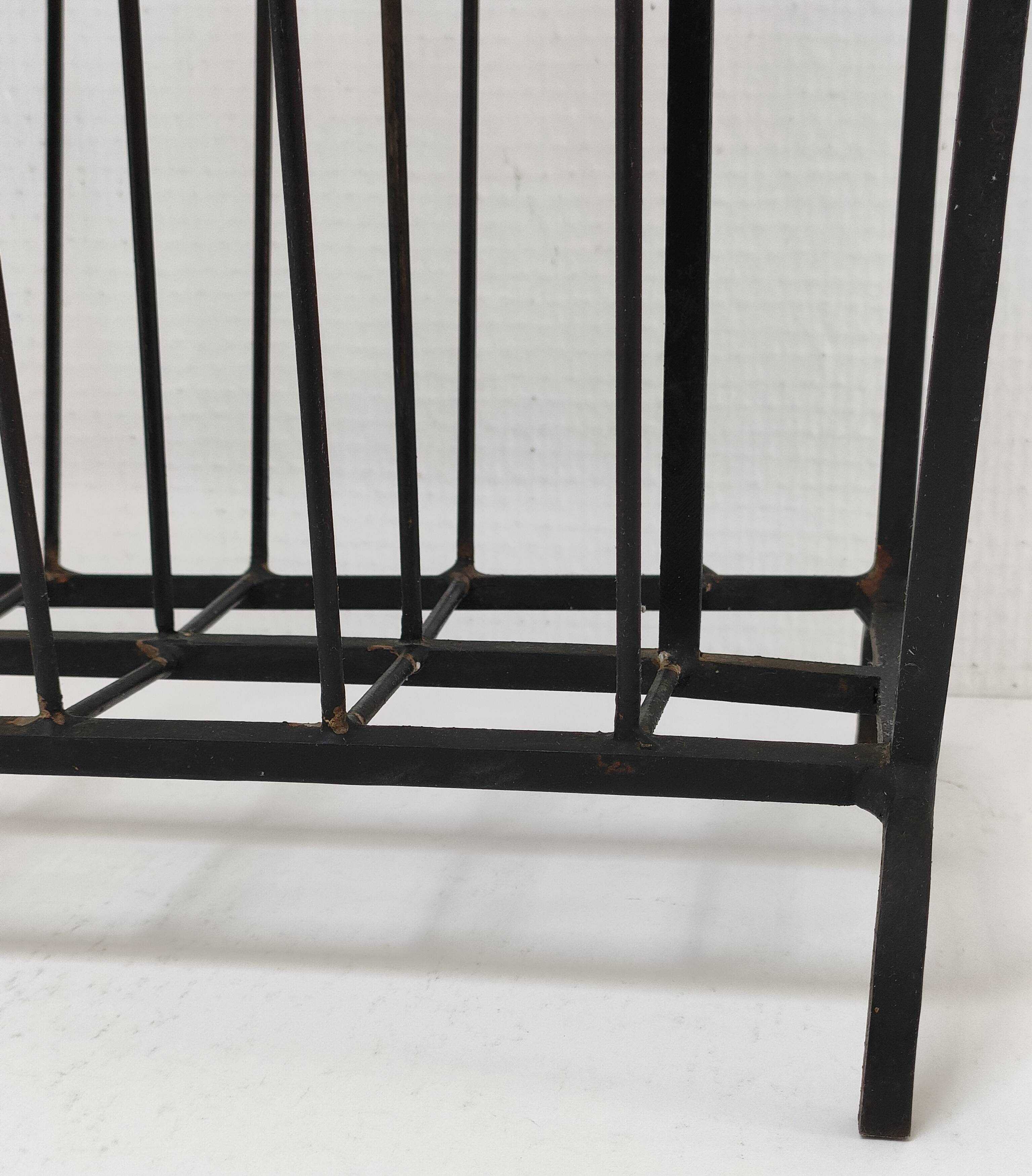 Modernist magazine holder black iron 60s