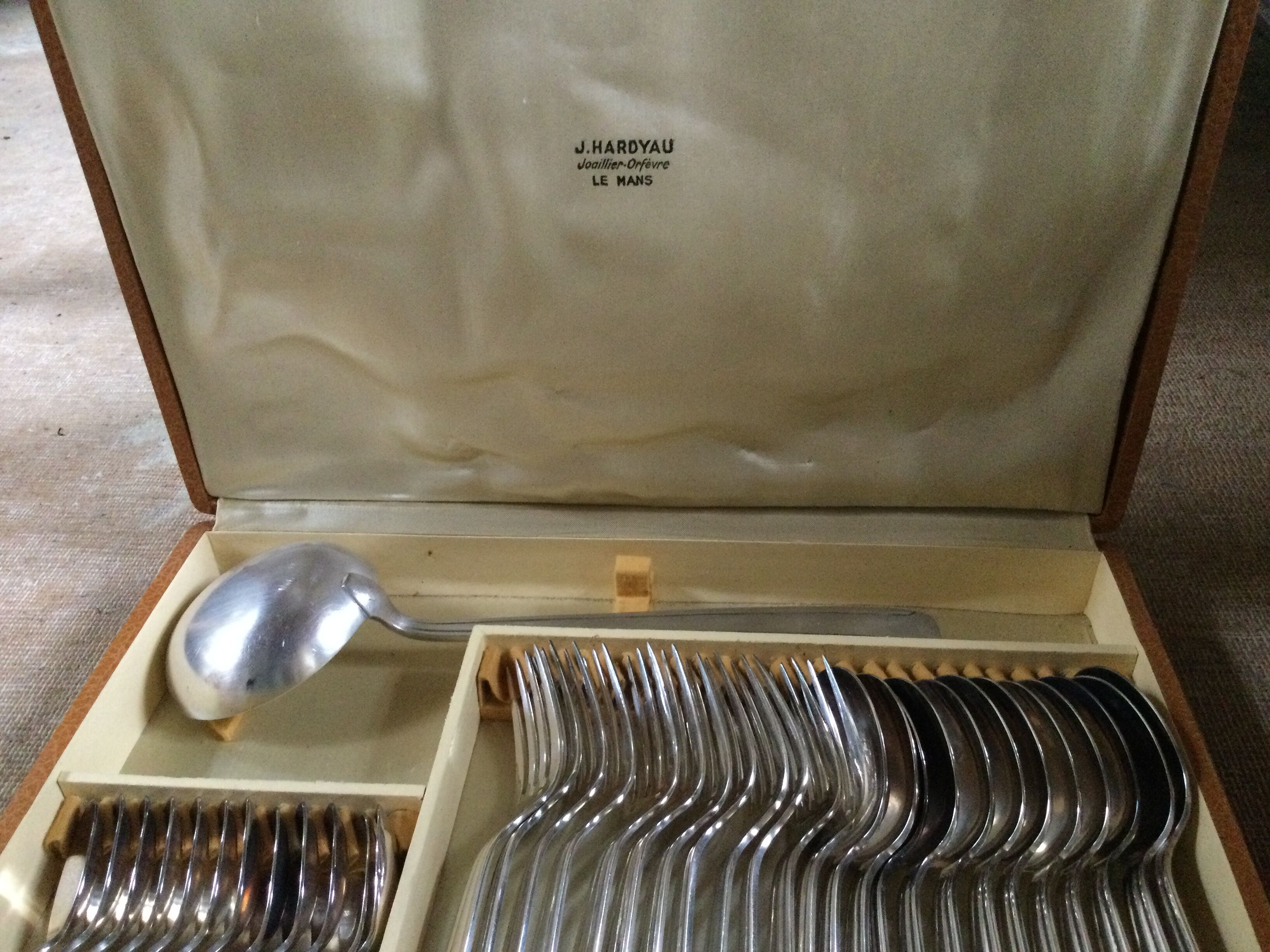 Old housewife in silver metal