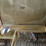 Old housewife in silver metal