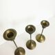 Trio of brass candlesticks