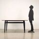 Vintage Italian table from the 1960s in stained ebony wood, with a teak veneer top.