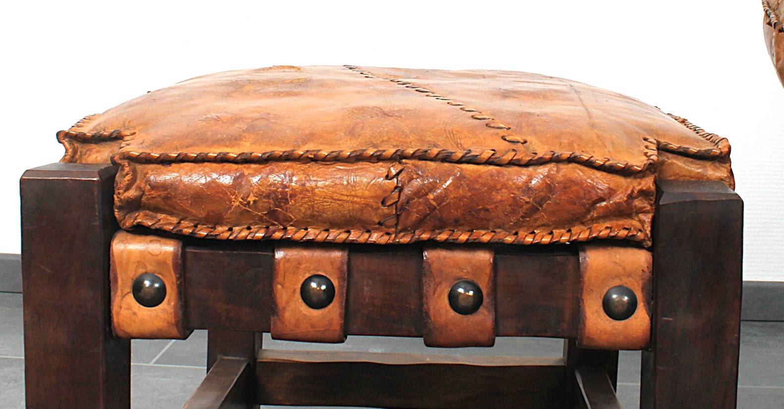 Brutalist oak lounge chair and ottoman, 1970s, set of 2