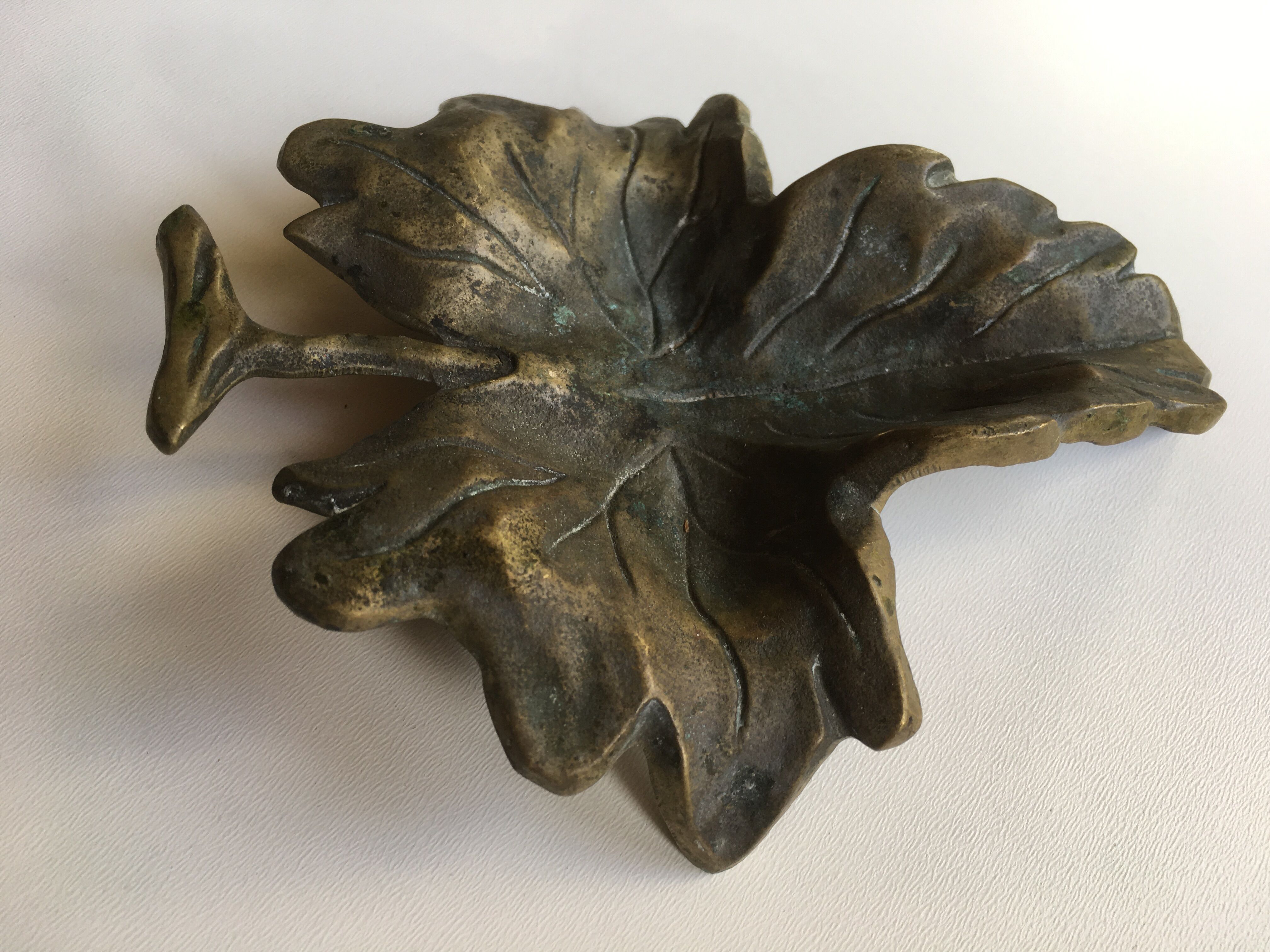 Empty pocket or ashtray leaf in old bronze