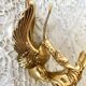 Double coat hook in Hollywood Regency style, brass swan