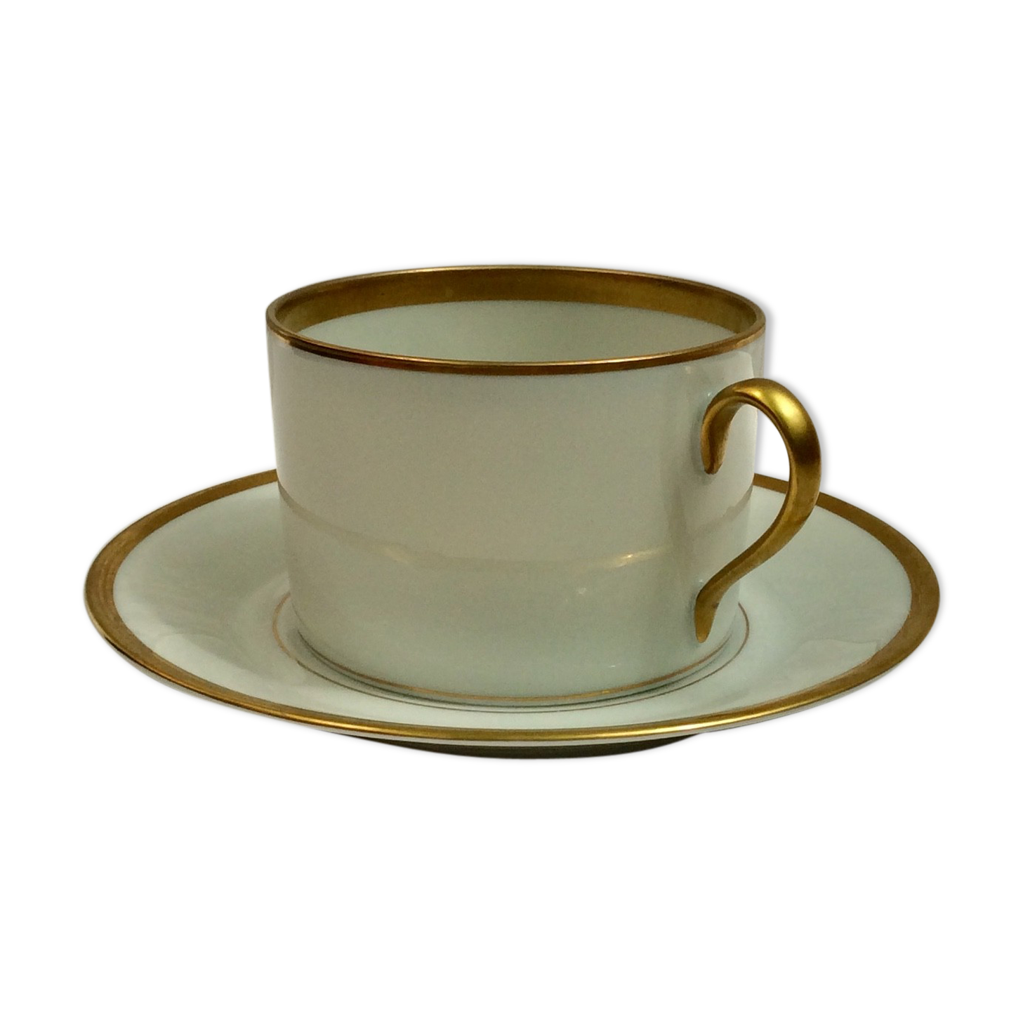 Teacup with its white Limoges saucer and fine-sized porcelain gold:H-6.5 D -17