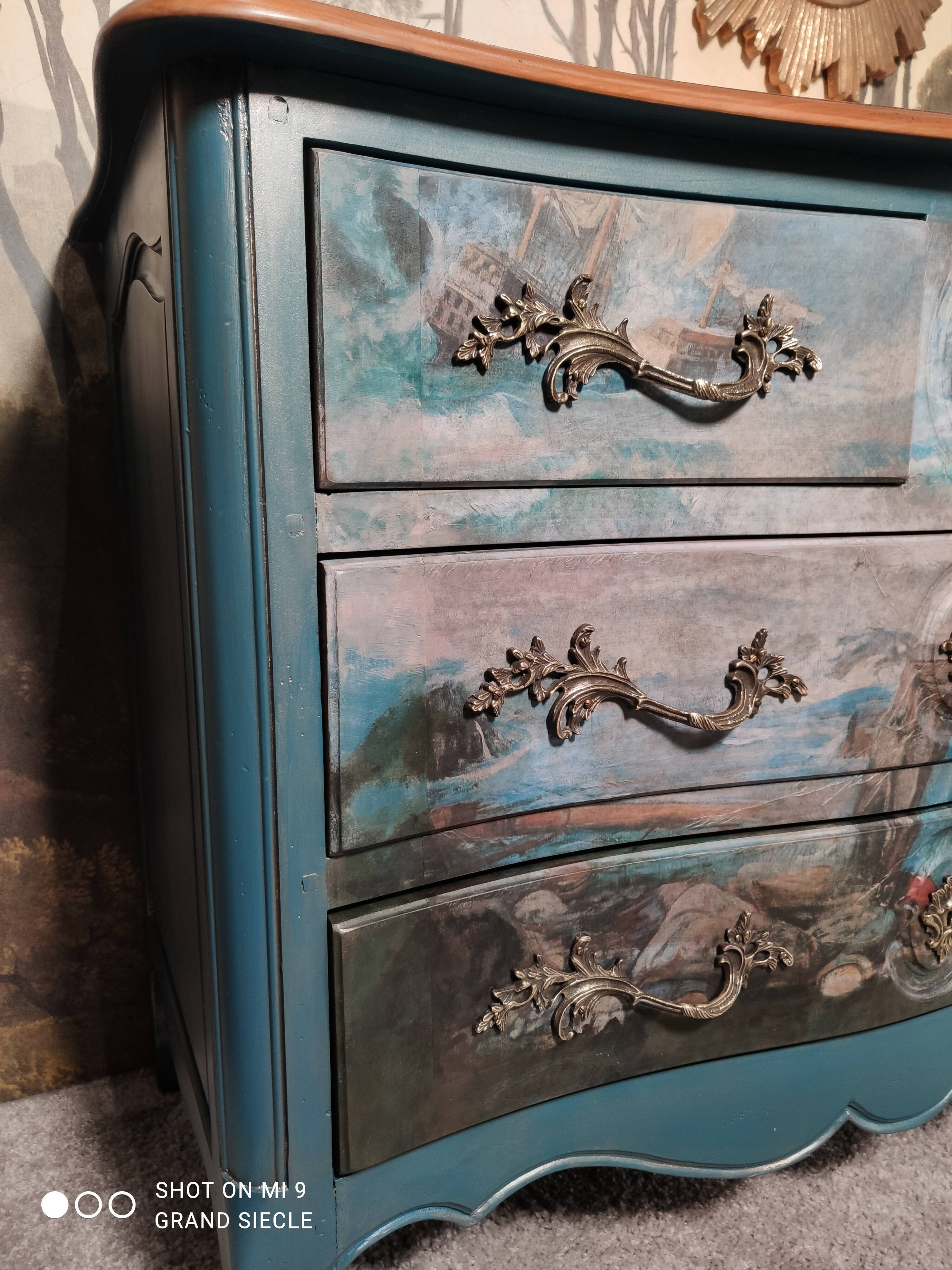 Patinated crossbow chest of drawers