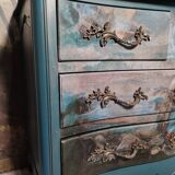 Patinated crossbow chest of drawers