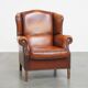 Fauteuil à oreilles en cuir de mouton