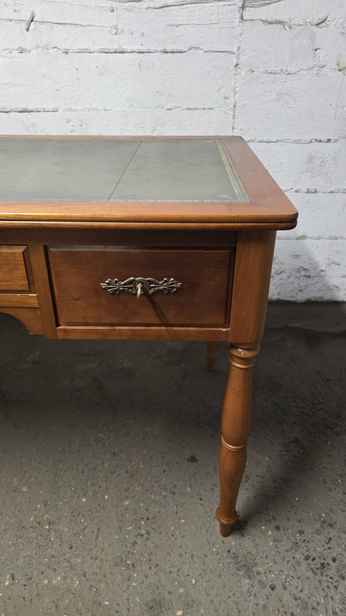 Flat leather desk, Louis-Philippe style, side pull-outs.