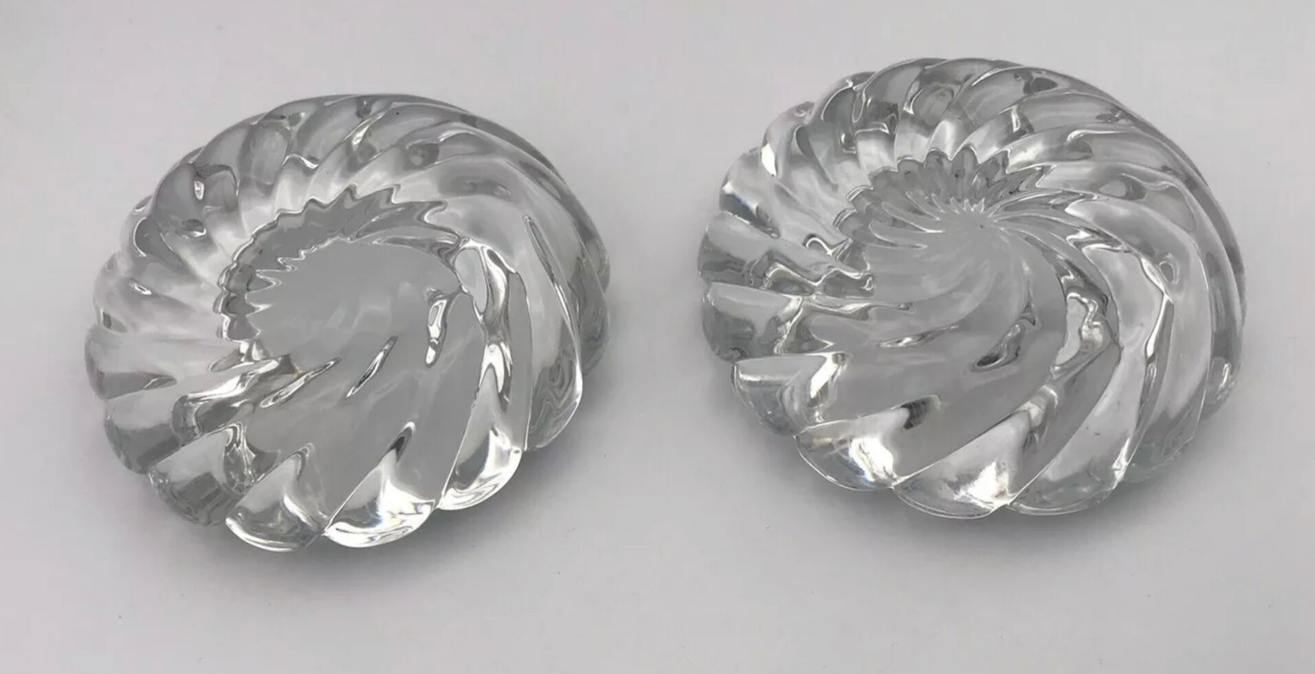 Pair of twisted round candlesticks in baccarat crystal stamped
