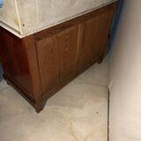 Antique wood and marble kitchen sideboard with carved backsplash