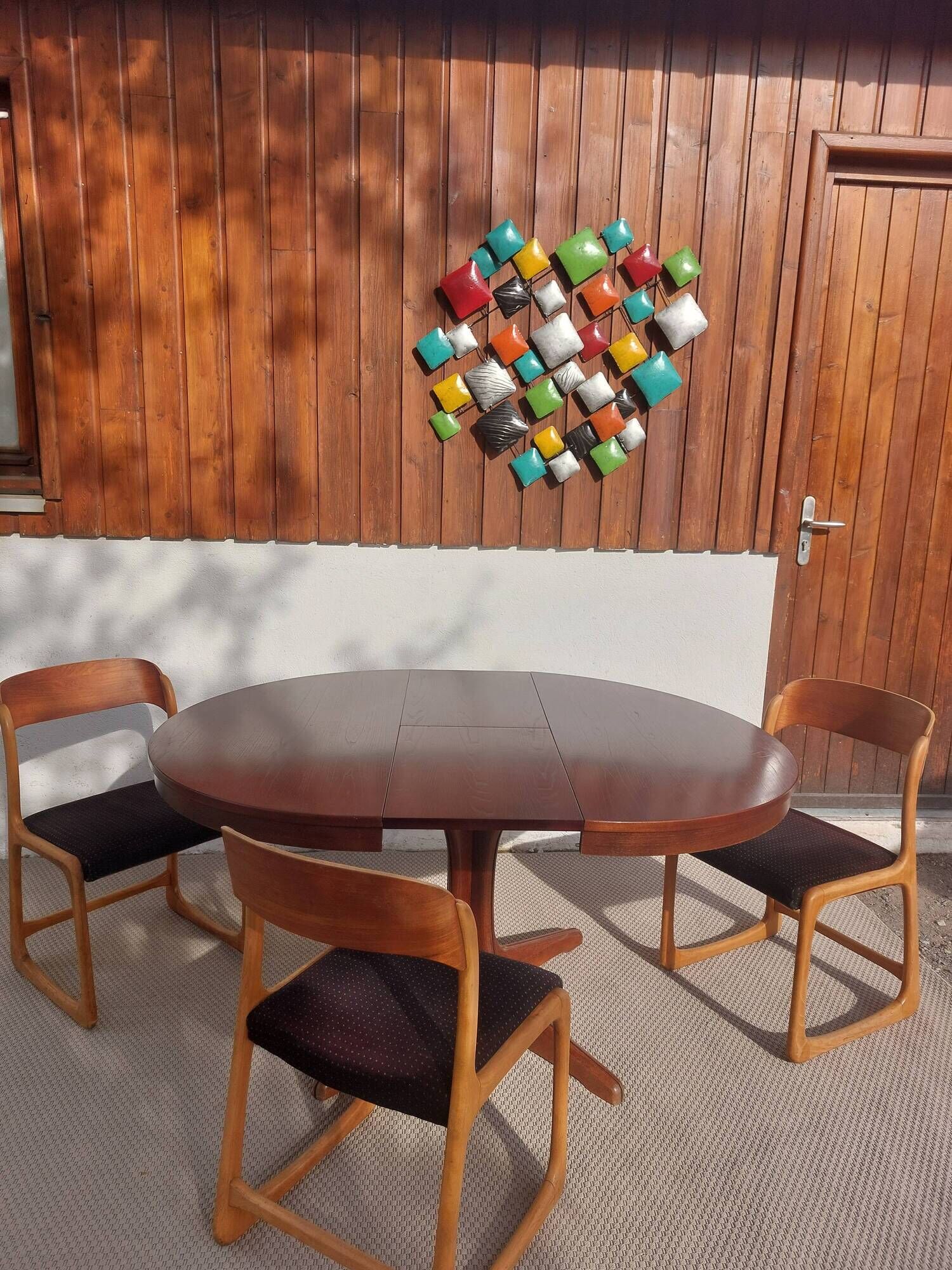 round/oval table with extension, central leg, dark shade, Baumann design