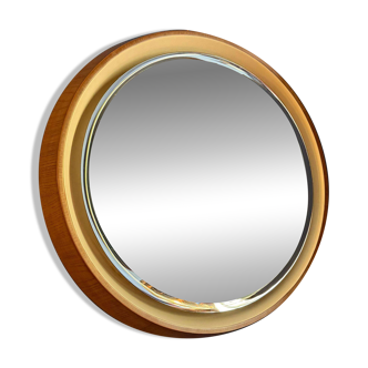 Backlit mirror designed by Gio Ponti in wood and lacquer. Italy, 1970s.