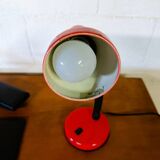 Red flexible desk lamp