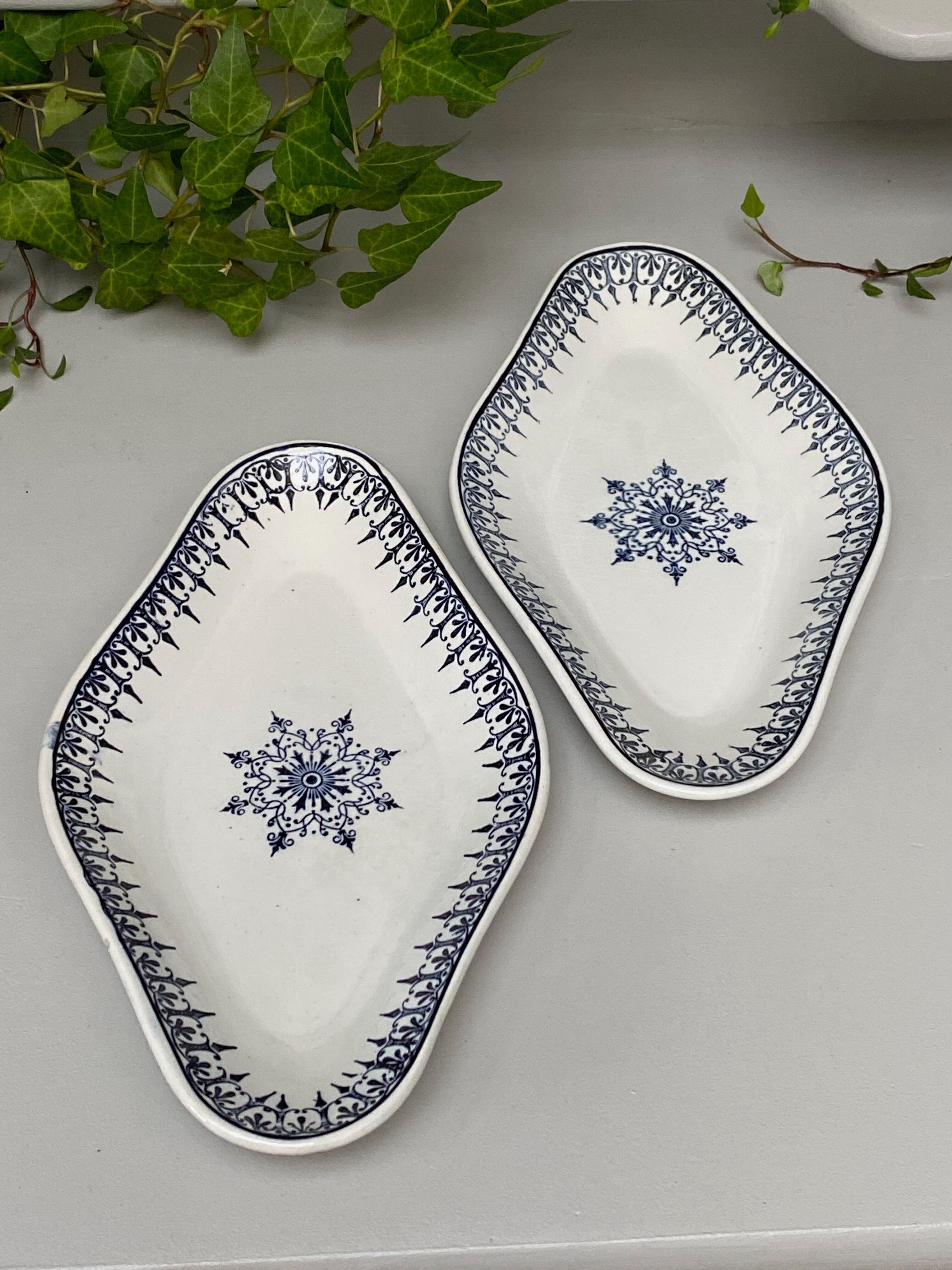 Pairs of old dishes St Amand