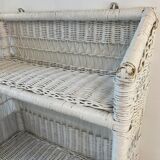 White wicker wall shelf