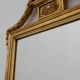 Miroir de style Empire en bois doré du XXe siècle
