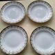 Set of 4 antique hollow plates in Limoges ULM porcelain