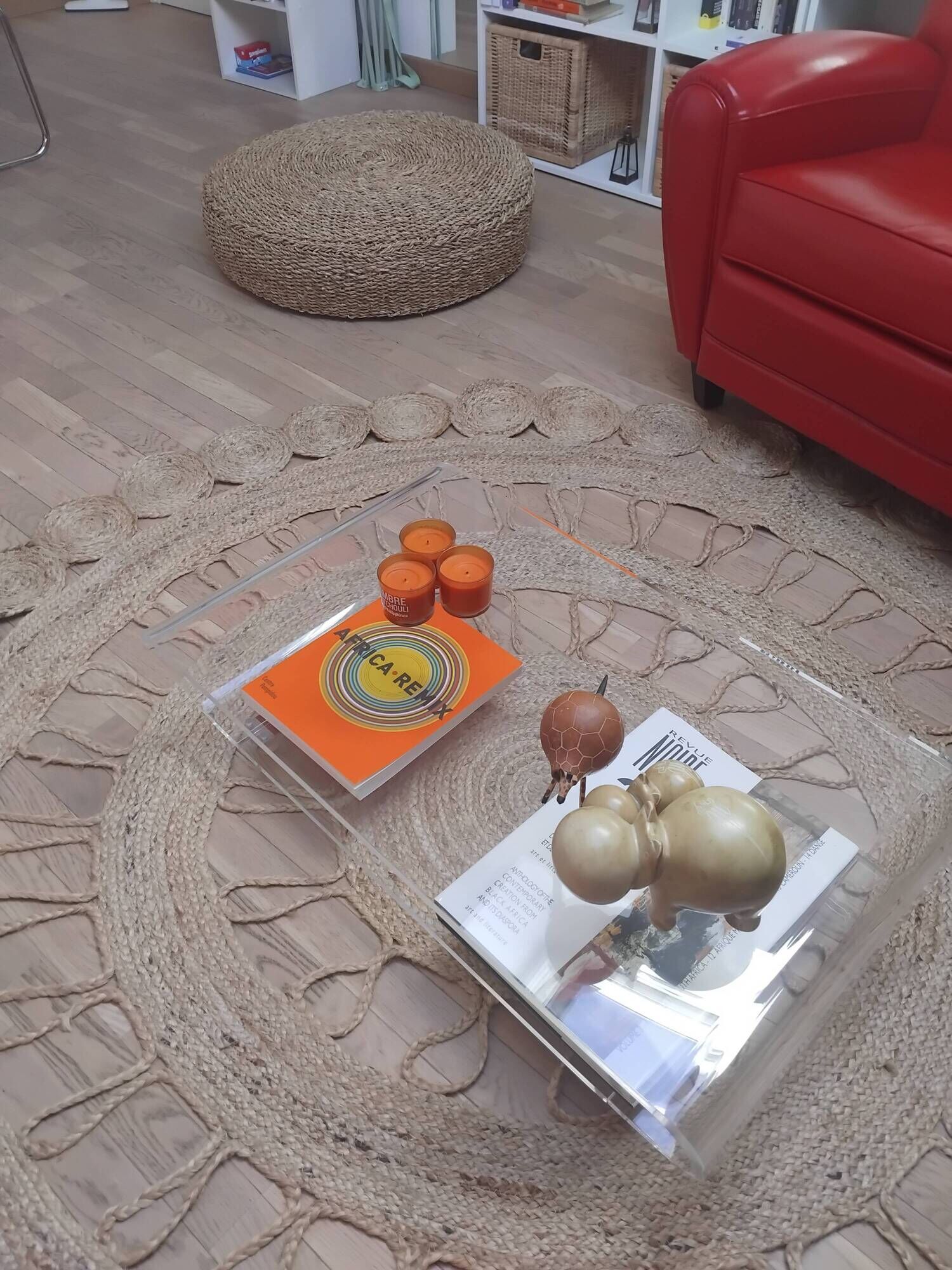 Design coffee table from Habitat in transparent plexiglass, mounted on wheels.