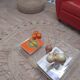 Design coffee table from Habitat in transparent plexiglass, mounted on wheels.